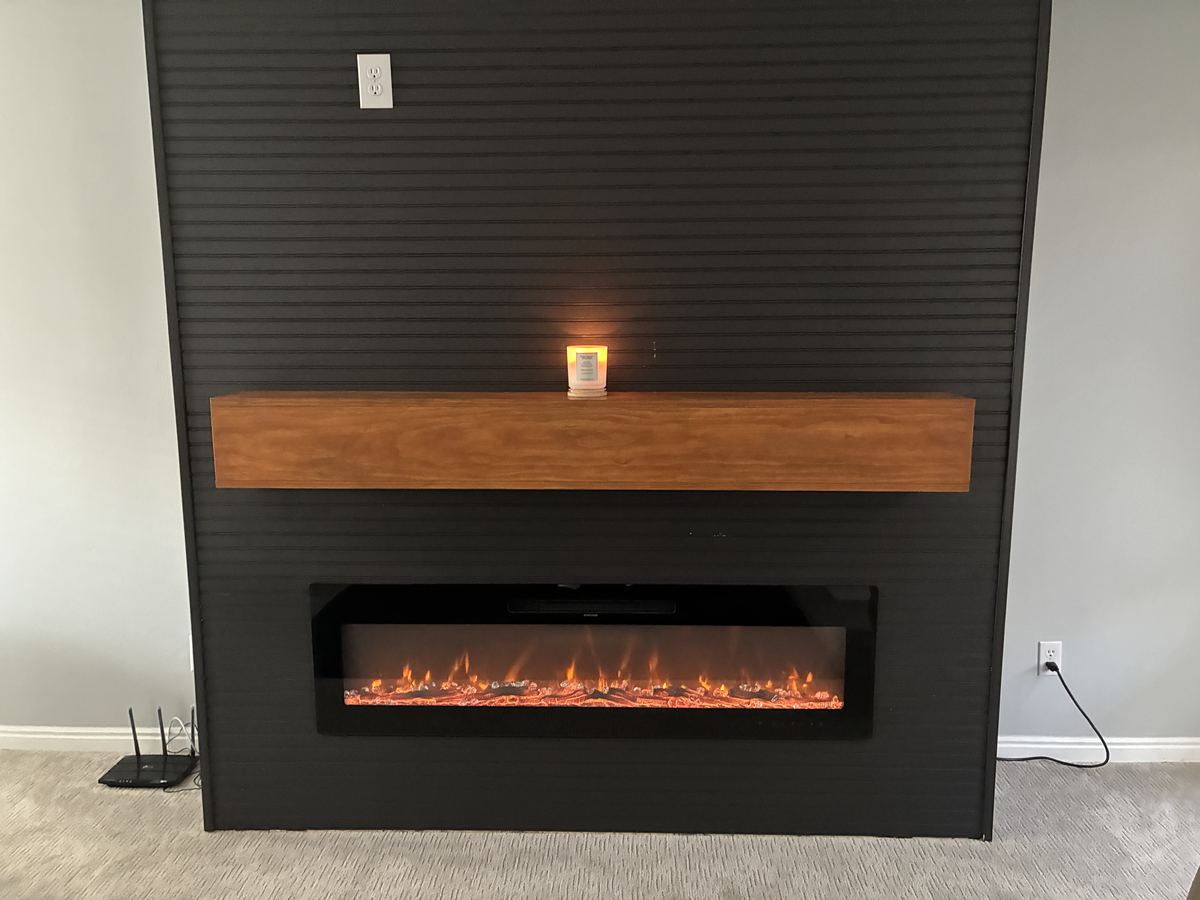 Finished fireplace with amber lighting